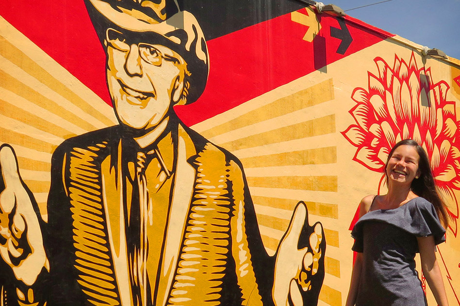 Taking a photo on Shepard Fairey's Wall