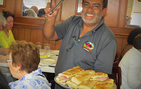 Serving cuban sandwiches