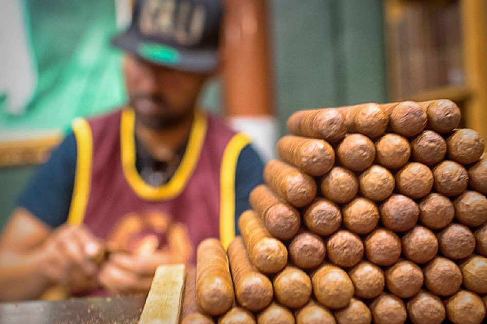 Making hand rolled cigars at Cuba Tobacco Cigar Co
