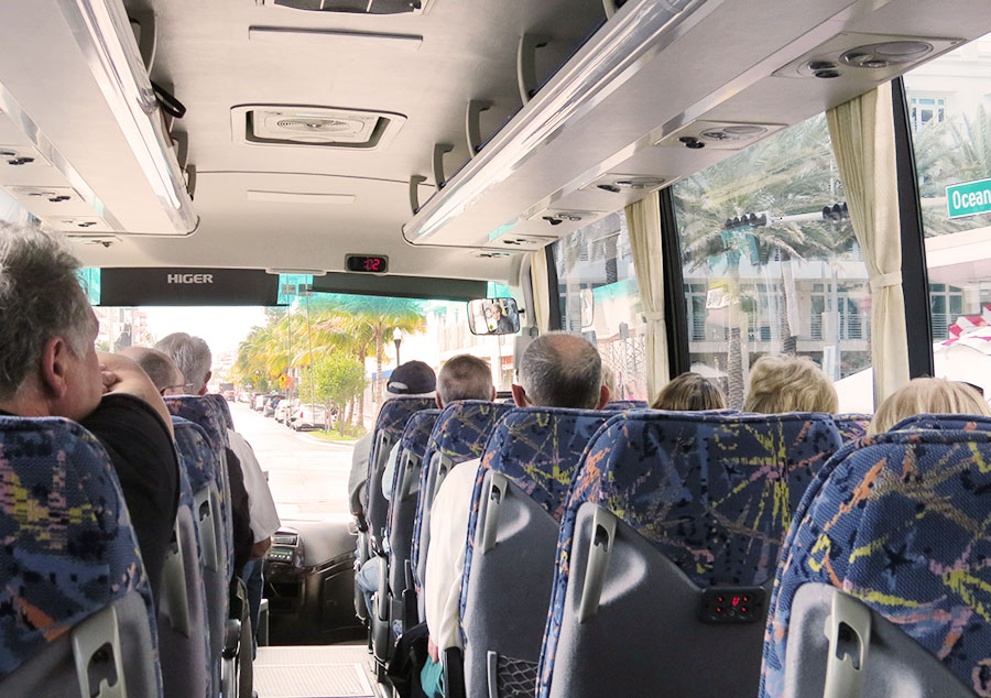 The Bus: Our buses have extra legroom and seats equipped with isle slides for more hip room