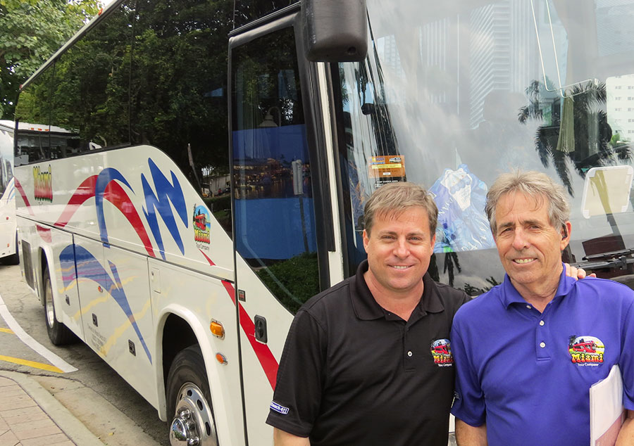 The Bus: Our certified Florida Heritage Tour Guide, Jim, with Gus, in front of the bus